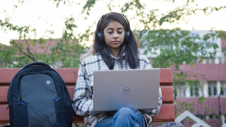 A student working on a laptop
